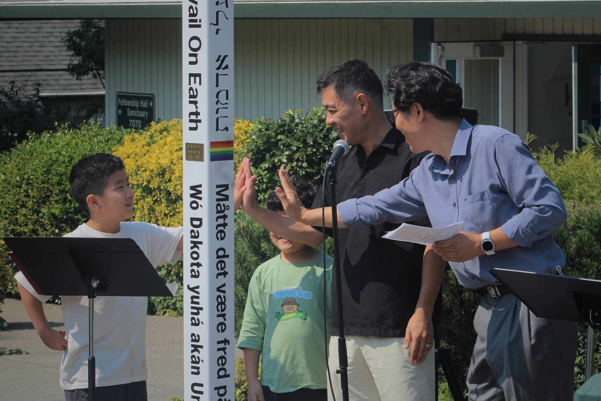 Attendees enjoy their time at the peace-pole installation and dedication ceremony on Aug. 19 at Mercer Island United Methodist Church. Photo courtesy of Brooks Kahsai