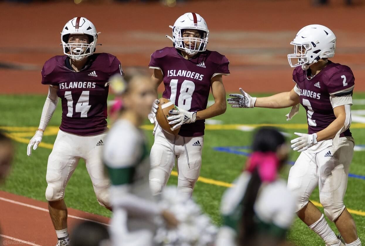 Mercer Island’s Charlie Chatalas (18) grabbed his third interception of the season in the Islanders’ 21-11 win over Redmond on Sept. 14. Photo courtesy of Linda Kercher