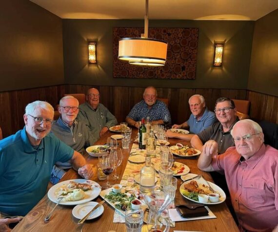 <p>John Hamer (at left) and his old high-school friends at their recent dinner. (Courtesy photo)</p>