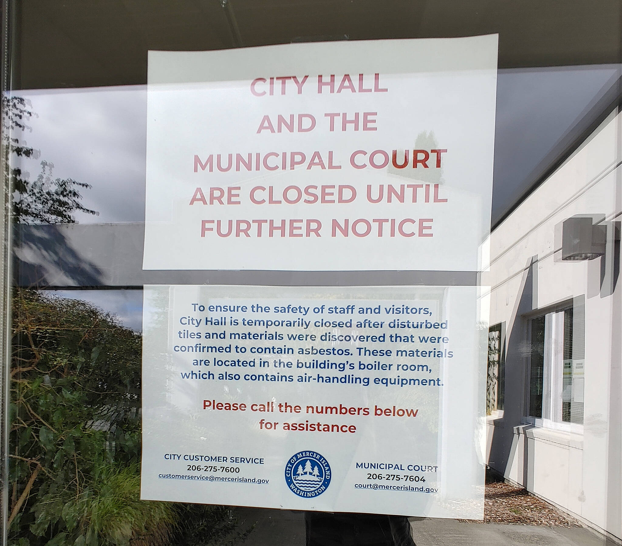 A sign is placed on the front doors of Mercer Island City Hall. Andy Nystrom/ staff photo