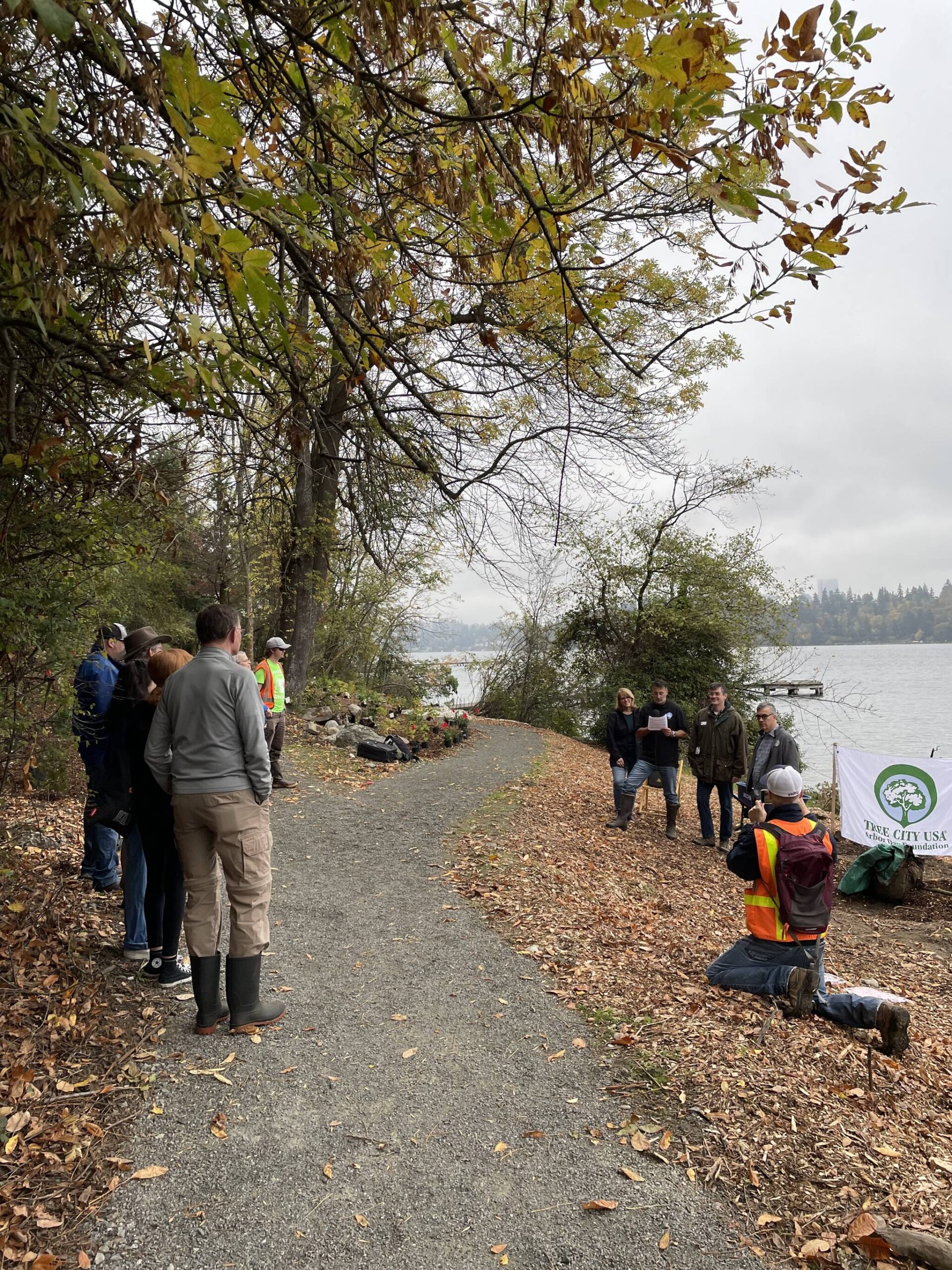 Mayor Salim Nice is joined by city councilmembers Wendy Weiker, Ted Weinberg and Craig Reynolds at the Arbor Day planting event on Oct. 21 at Luther Burbank Park. Photo courtesy of the city of Mercer Island