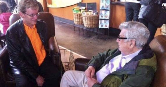 Abraham Kaplan (right) visits with organist Mark Thallander in the Mercer Island Starbucks. (Courtesy photo)