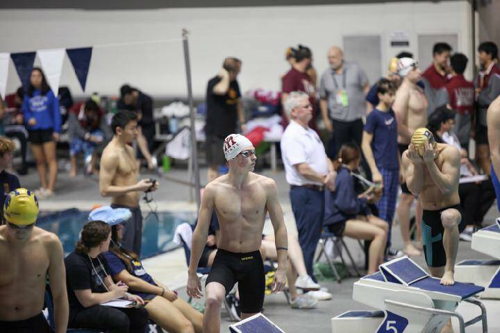 Mercer Island High School senior swimmer Jack Sieckhaus, middle in white cap, prepares for a race. Photo courtesy of Jeremy Winn