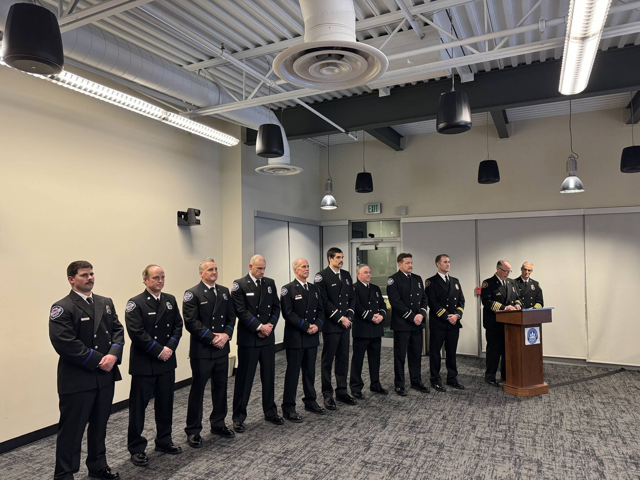 A host of Mercer Island firefighters were pinned at a promotional ceremony at the Dec. 5 Mercer Island City Council meeting. Fourteen firefighters were promoted as part of the city’s transition to Eastside Fire & Rescue; not all were present at the meeting. Photo courtesy of the city of Mercer Island