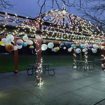 The city of Mercer Island invites community members of all ages to participate in this year’s Island Lanterns event. Residents can decorate or design a paper lantern to be displayed as part of an illuminated installation at the Veterans’ Pergola in Mercerdale Park (last year’s lantern display is pictured) and at the Mercer Island Community and Event Center from Feb. 1-March 31. Free solar lanterns are currently available for community members to transform with their creativity at the community center, and painted lanterns must be returned by Jan. 31 to be installed for the event. Islanders can paint a lantern with friends at an event from 1-5 p.m. on Jan. 20 at the community center. For more information, visit <a href="https://www.mercerisland.gov/parksrec/page/island-lanterns" target="_blank">https://www.mercerisland.gov/parksrec/page/island-lanterns </a>