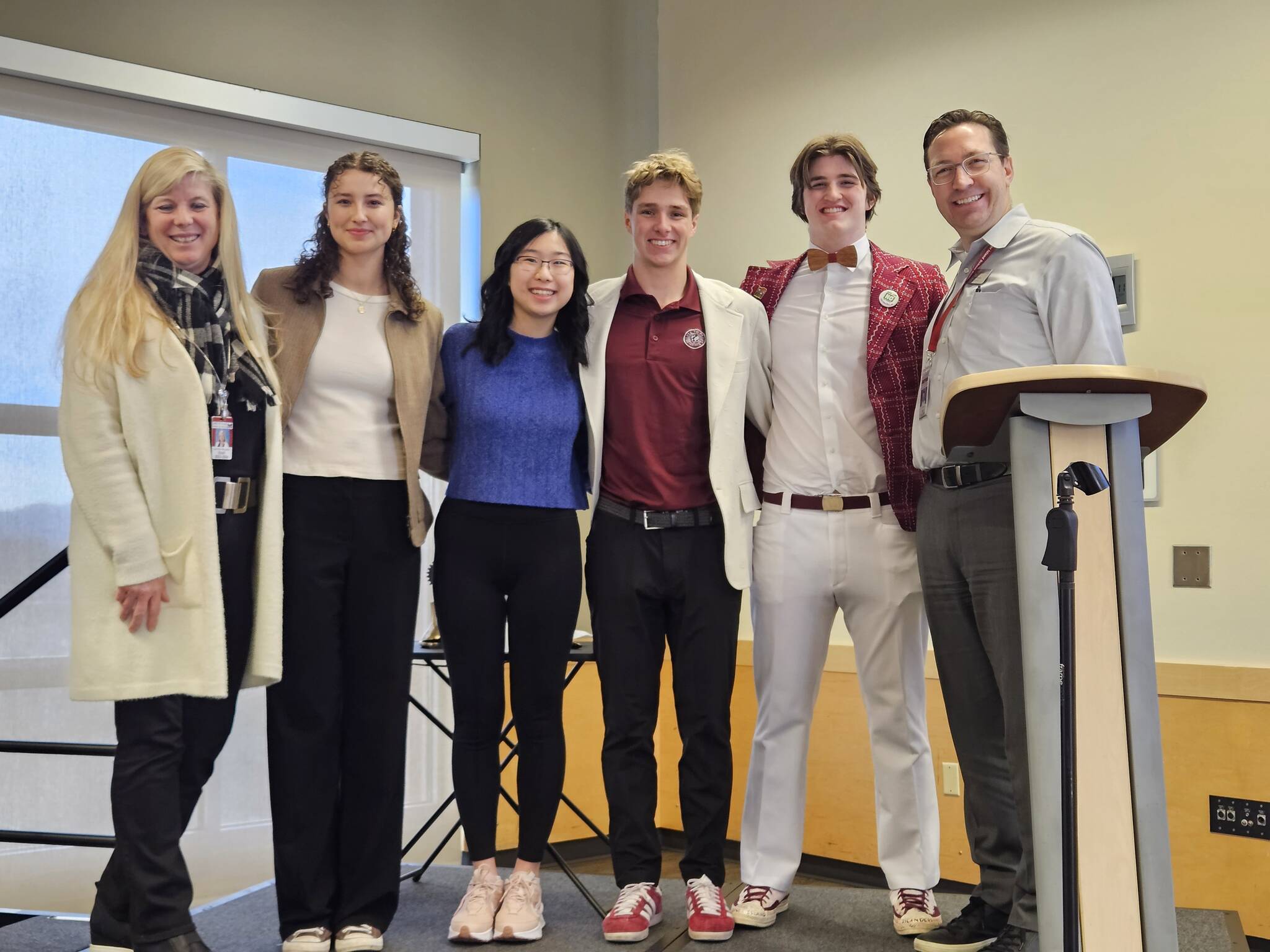 From left, Mercer Island High School instructor Jen McLellan, Moa Valentin, Clara Mak, Jack Sieckhaus, Dylan Shobe and Mercer Island School District Superintendent Fred Rundle at the Rotary Club of Mercer Island meeting on Jan. 16 at the Mercer Island Community and Event Center. Photo courtesy of John Hamer