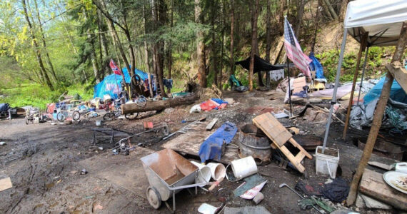 Trash and various debris at a Green River homeless encampment in unincorporated King County along 94th Place South between Kent and Auburn. COURTESY PHOTO