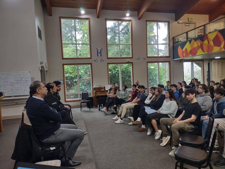 On the afternoon of Jan. 26, a group of foreign delegates representing Sharaka shared their experiences and hope for the future with Northwest Yeshiva High School students during an all-school assembly on the Mercer Island campus. Photo courtesy of Northwest Yeshiva High School