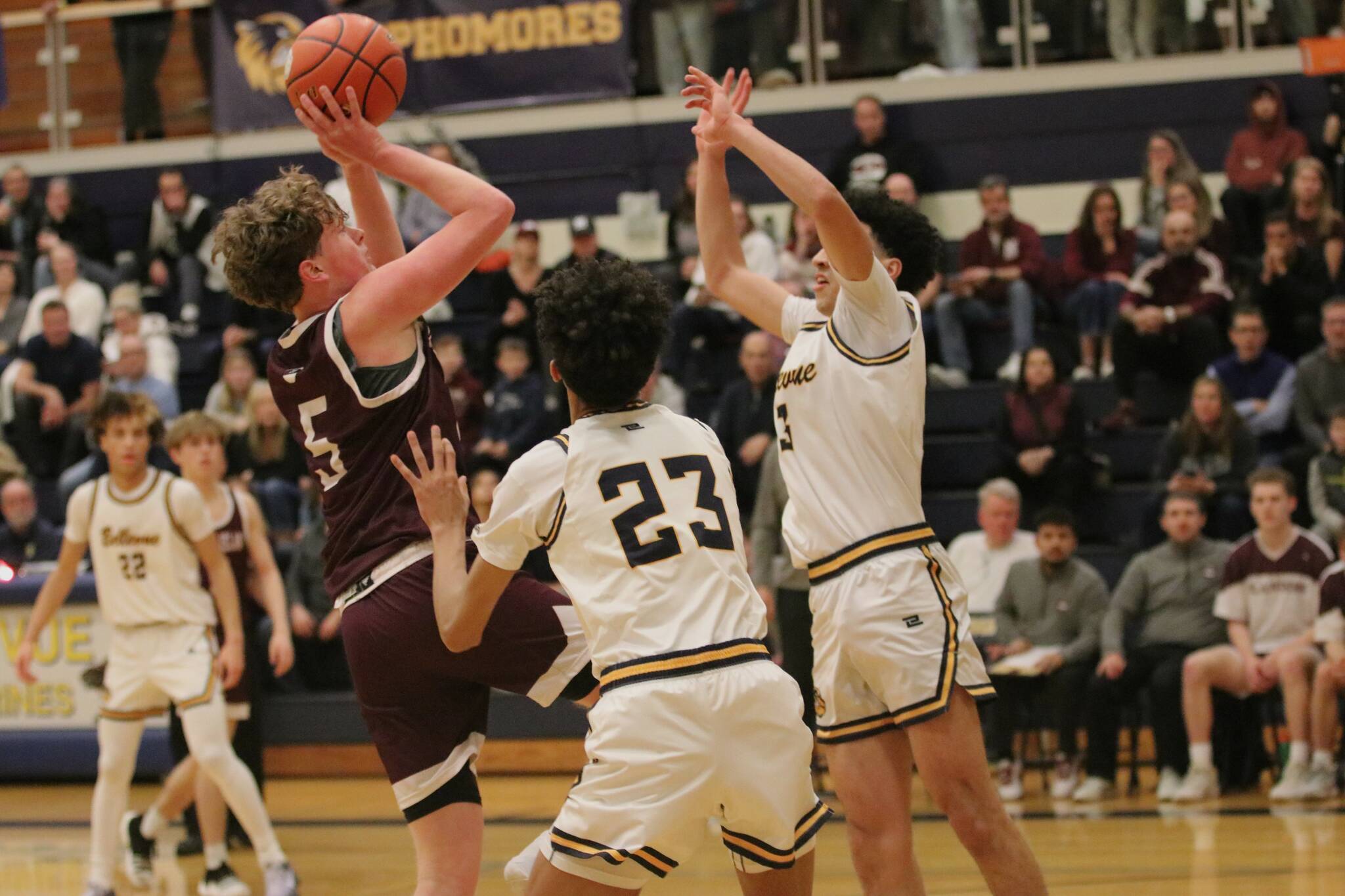 Mercer Island High School’s Ryan Boyle attacks the hoop against Bellevue High School on Feb. 5. Photo courtesy of Lis Larkin