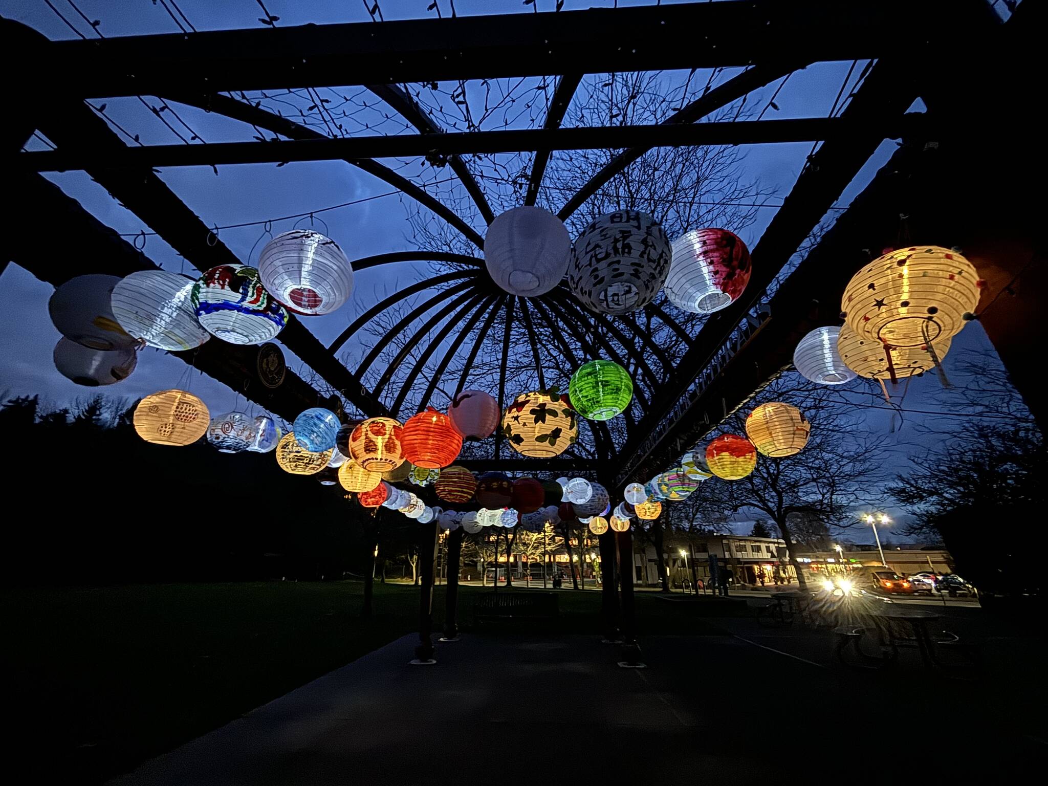The citys Island Lanterns event is in full effect as community members paper creations are currently on display as an illuminated installation at the Veterans Pergola in Mercerdale Park. Andy Nystrom/ staff photo