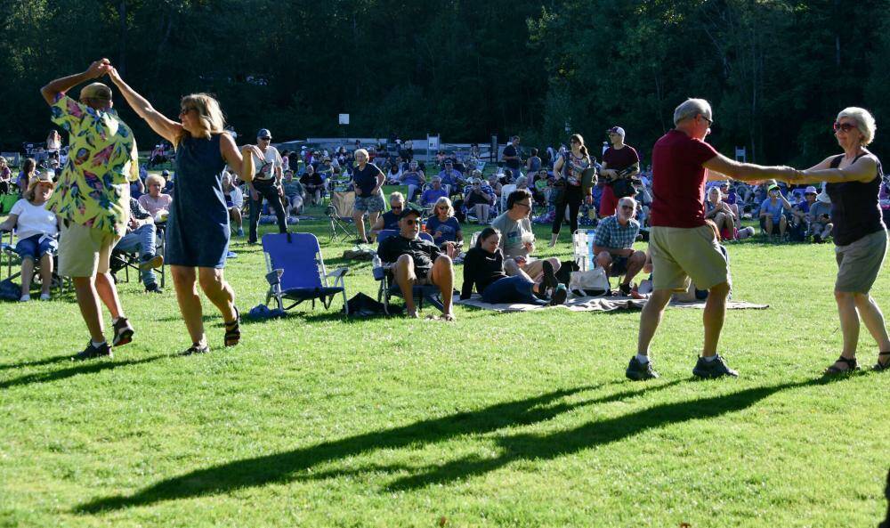 Dancers groove to the tunes at last summer’s Mostly Music in the Park at Mercerdale Park. Reporter file photo