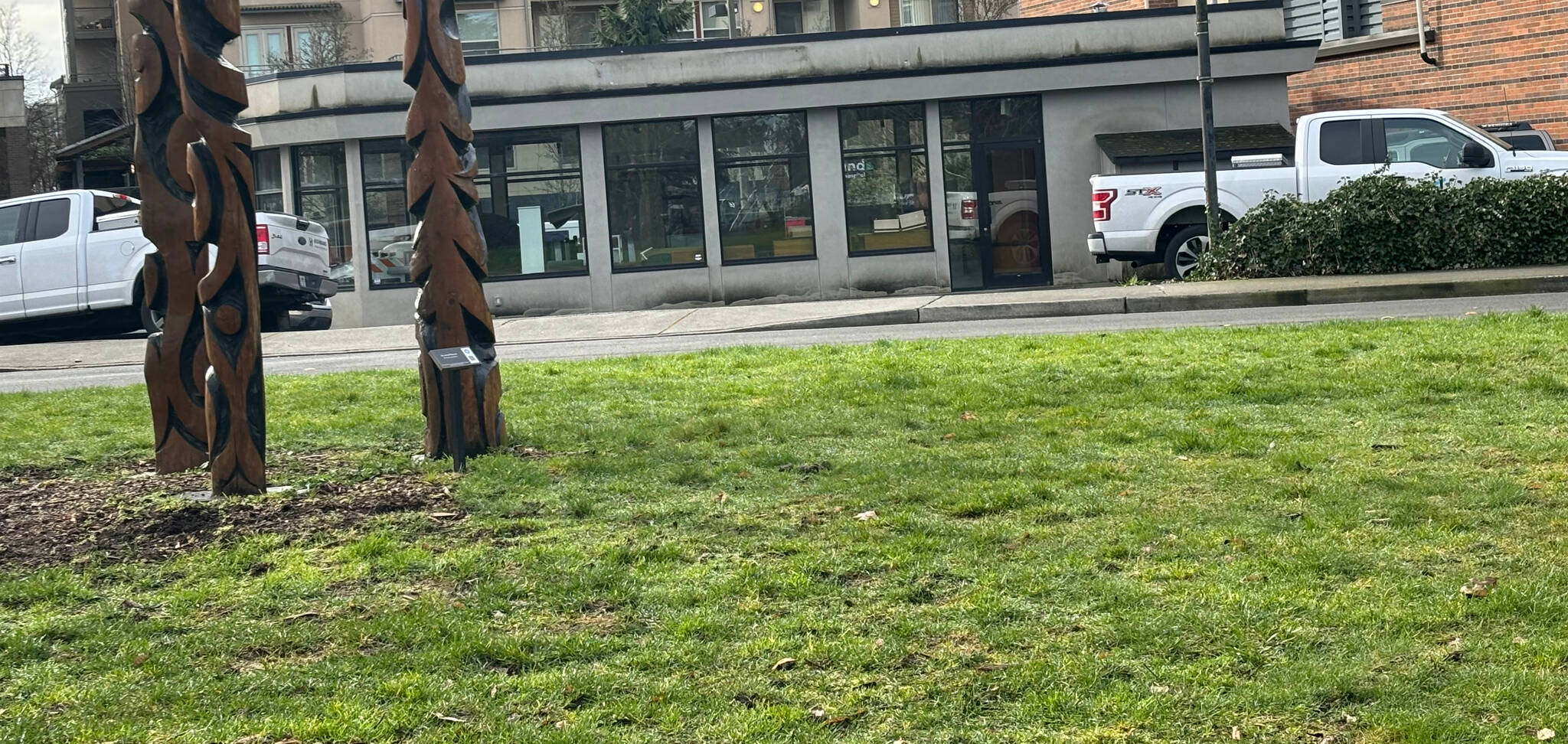 Pictured is the former Tully’s coffee shop building taken from the Greta Hackett Outdoor Sculpture Gallery. The building is proposed to be removed as part of the city’s Town Center long-term regional transit commuter parking project. Andy Nystrom/ staff photo