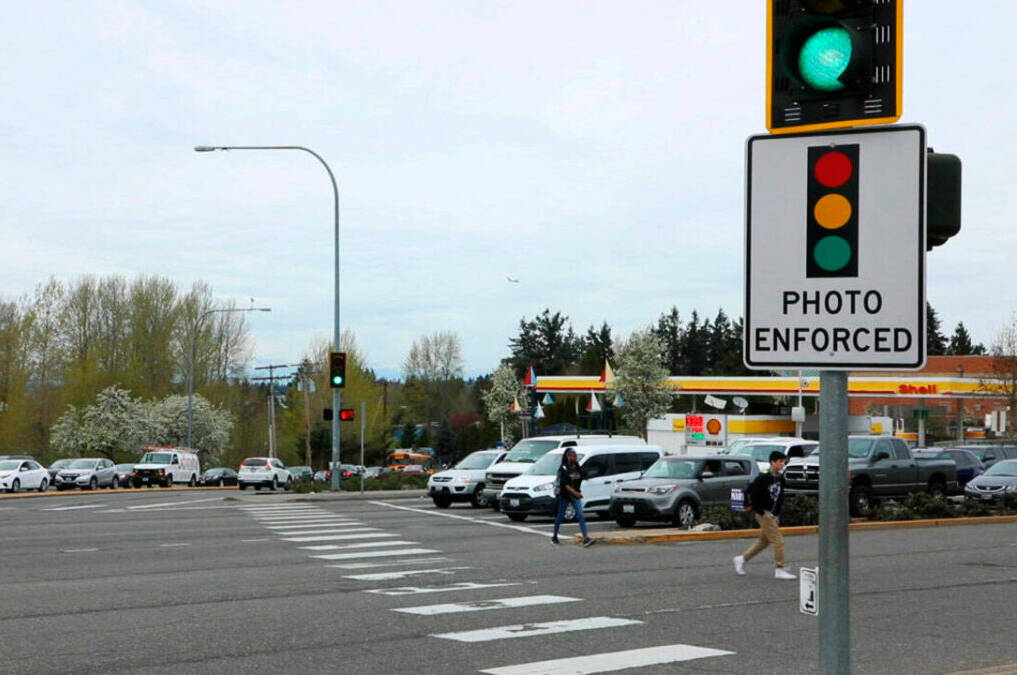 A red-light camera sign at Pacific Highway South and Kent Des Moines Road in Kent. File photo