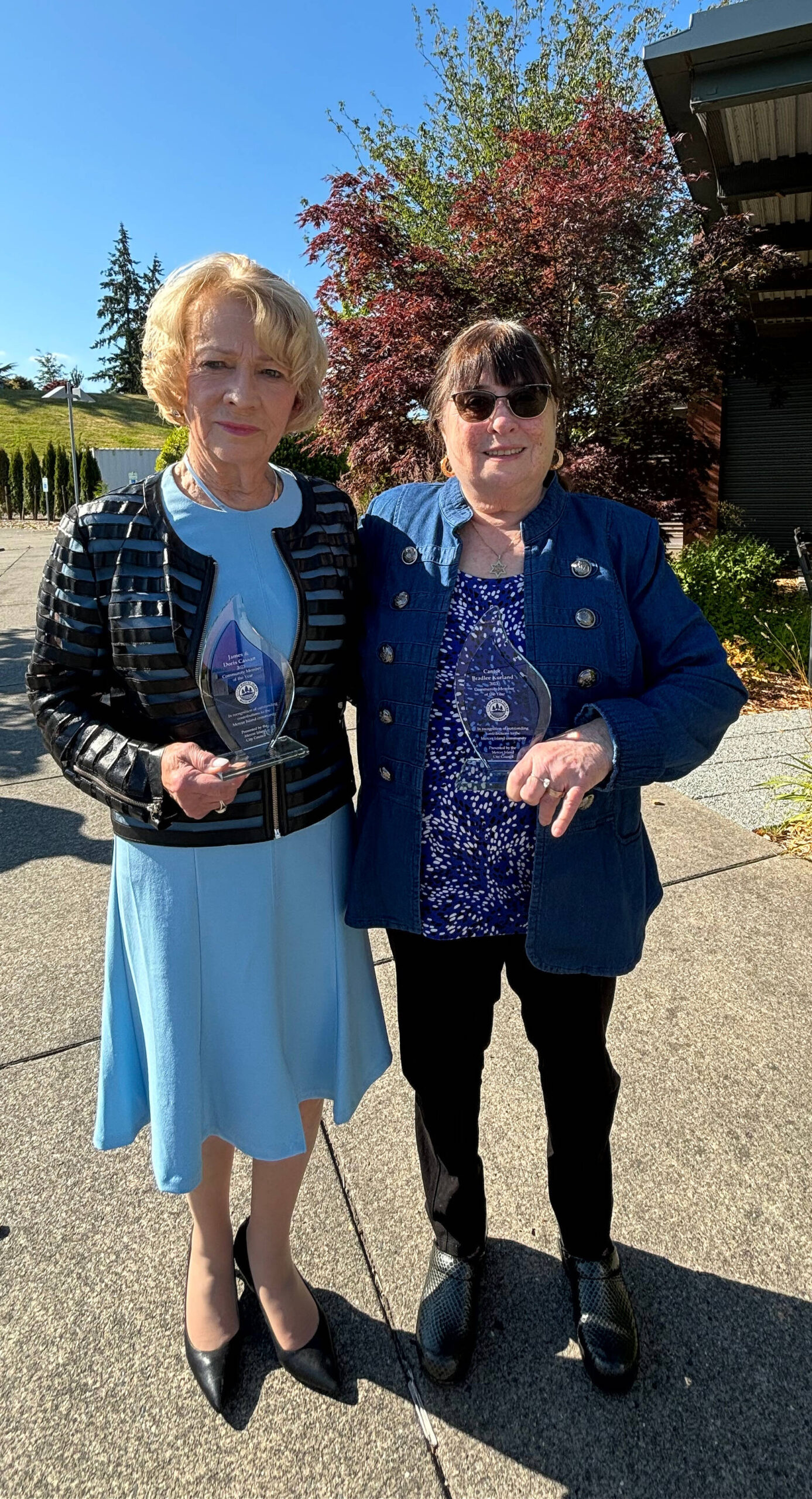 From left, Doris Cassan and Sandy Samuel attended the Mercer Island City Council meeting on June 18 to receive 2023 Community Members of the Year awards. Doris and her late husband James were honored along with Samuel’s late husband Cantor Bradlee Kurland. Andy Nystrom/ staff photo