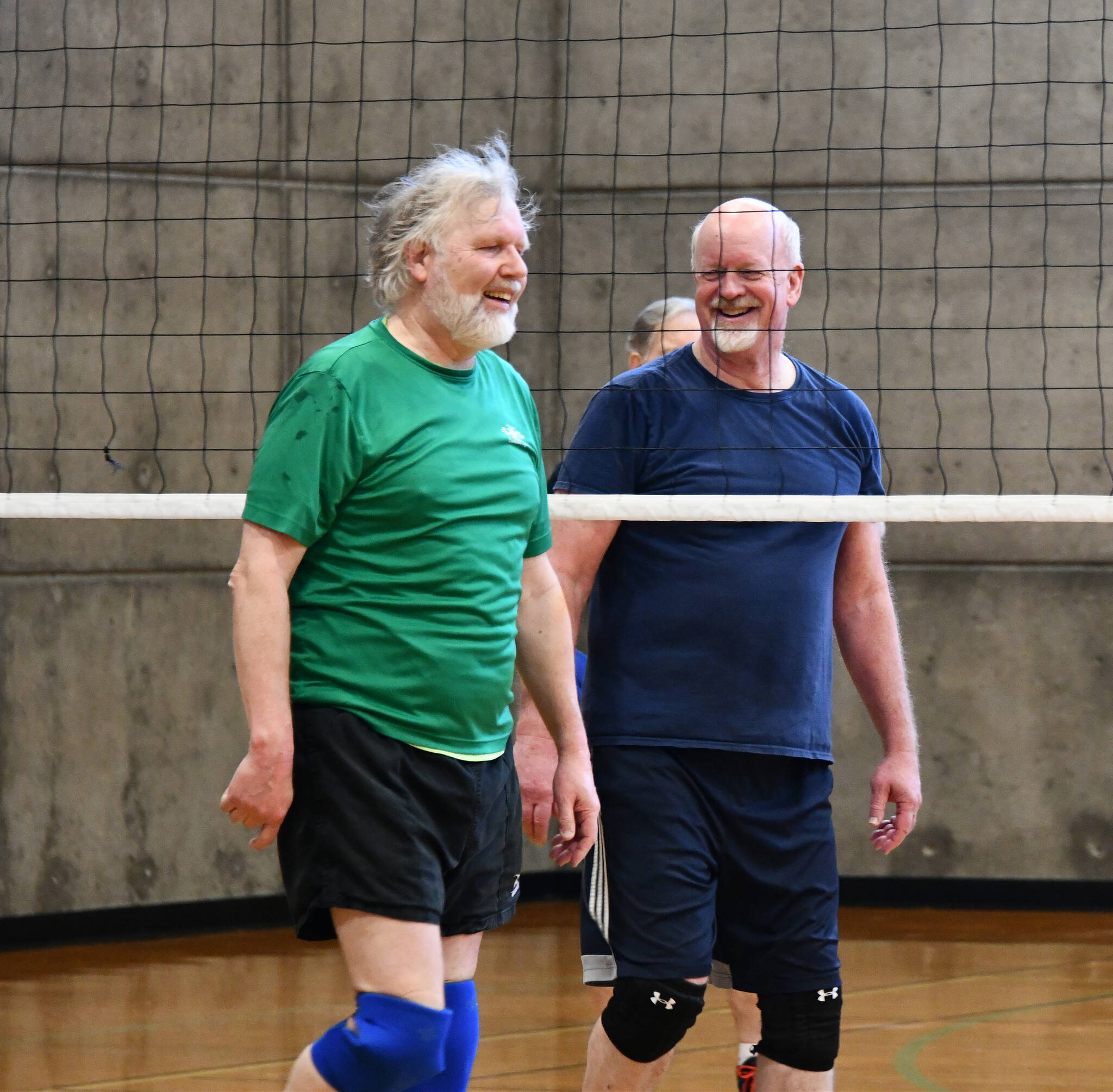 Robert Herzog, left, and Greg Dietzel enjoy a game of volleyball at the Mercer Island Community and Event Center. Andy Nystrom/ staff photo