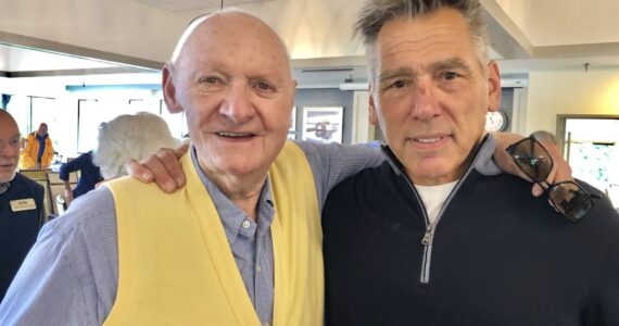 Coach Tommy Brasher and Jim Zorn. Photo by Greg Asimakoupoulos