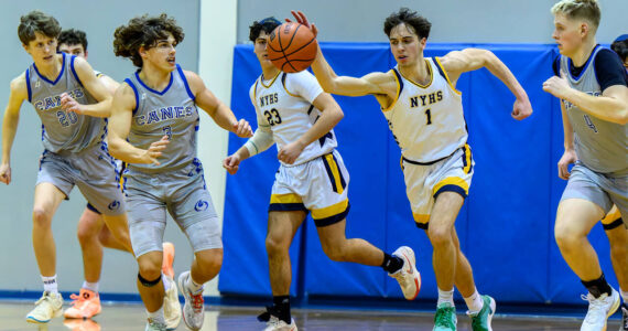 Evan Kaufthal gets control of the ball for NYHS vs. Mount Vernon Christian on Jan. 25, 2025. Photos courtesy of Patrick Krohn