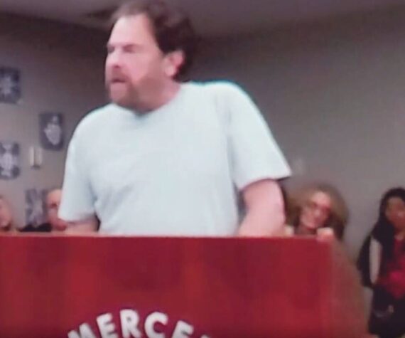 <p>Seth Landau during public comment at the recent Mercer Island School Board meeting. (Screenshot from YouTube)</p>