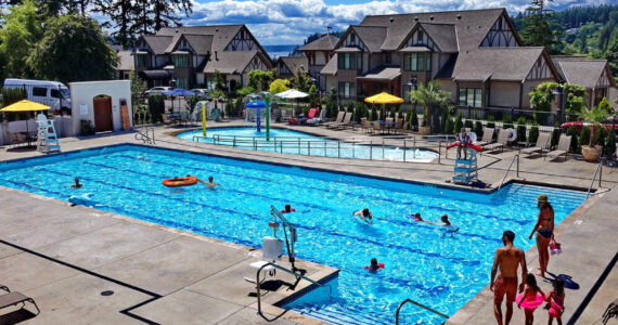 Guests can indulge in a range of amenities, including a seasonal outdoor pool. Photo courtesy of Pleasant Beach Village.