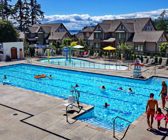 Guests can indulge in a range of amenities, including a seasonal outdoor pool. Photo courtesy of Pleasant Beach Village.