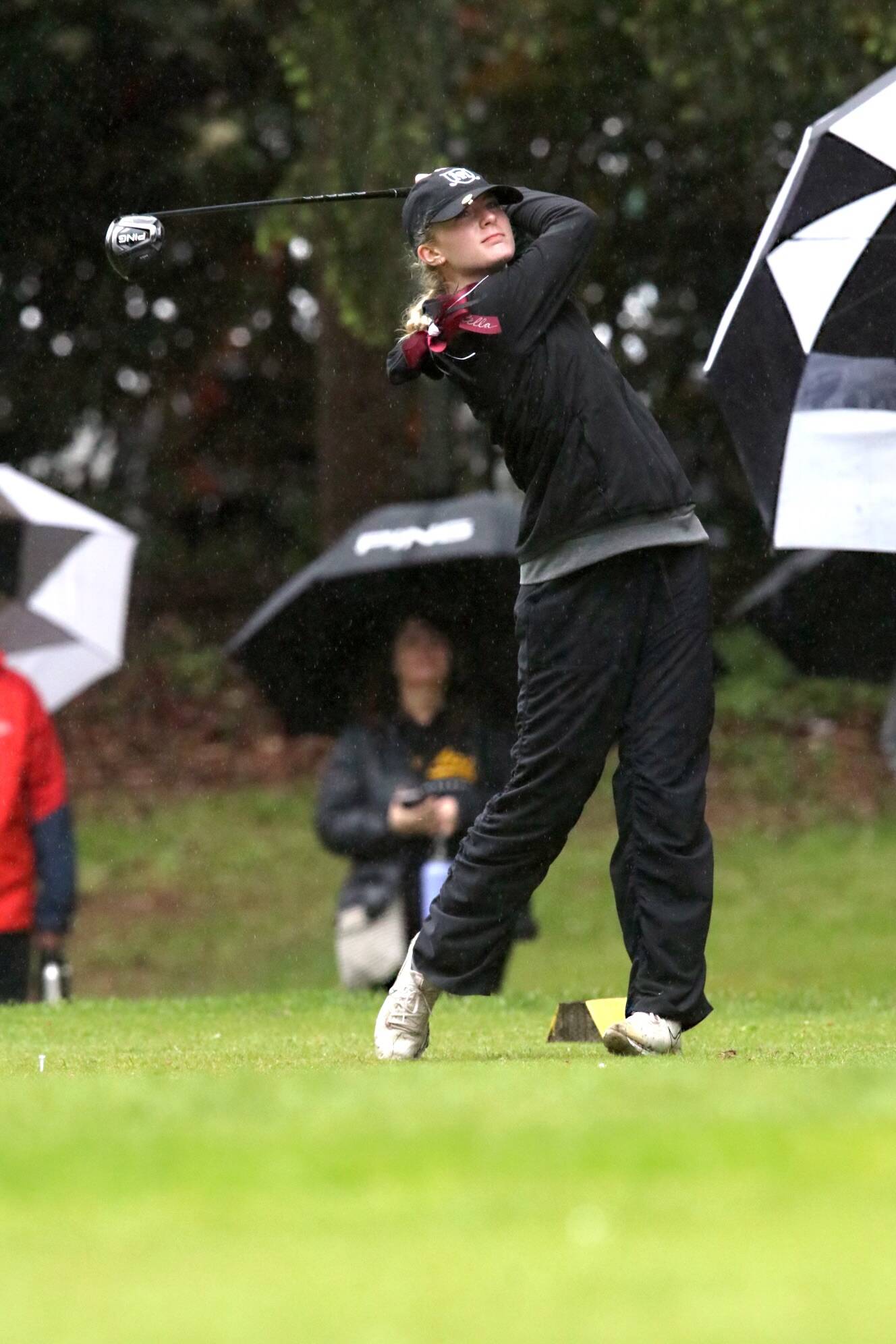 Mercer Island High School’s Estella Roodman tees off at the state tournament last spring. Courtesy photo