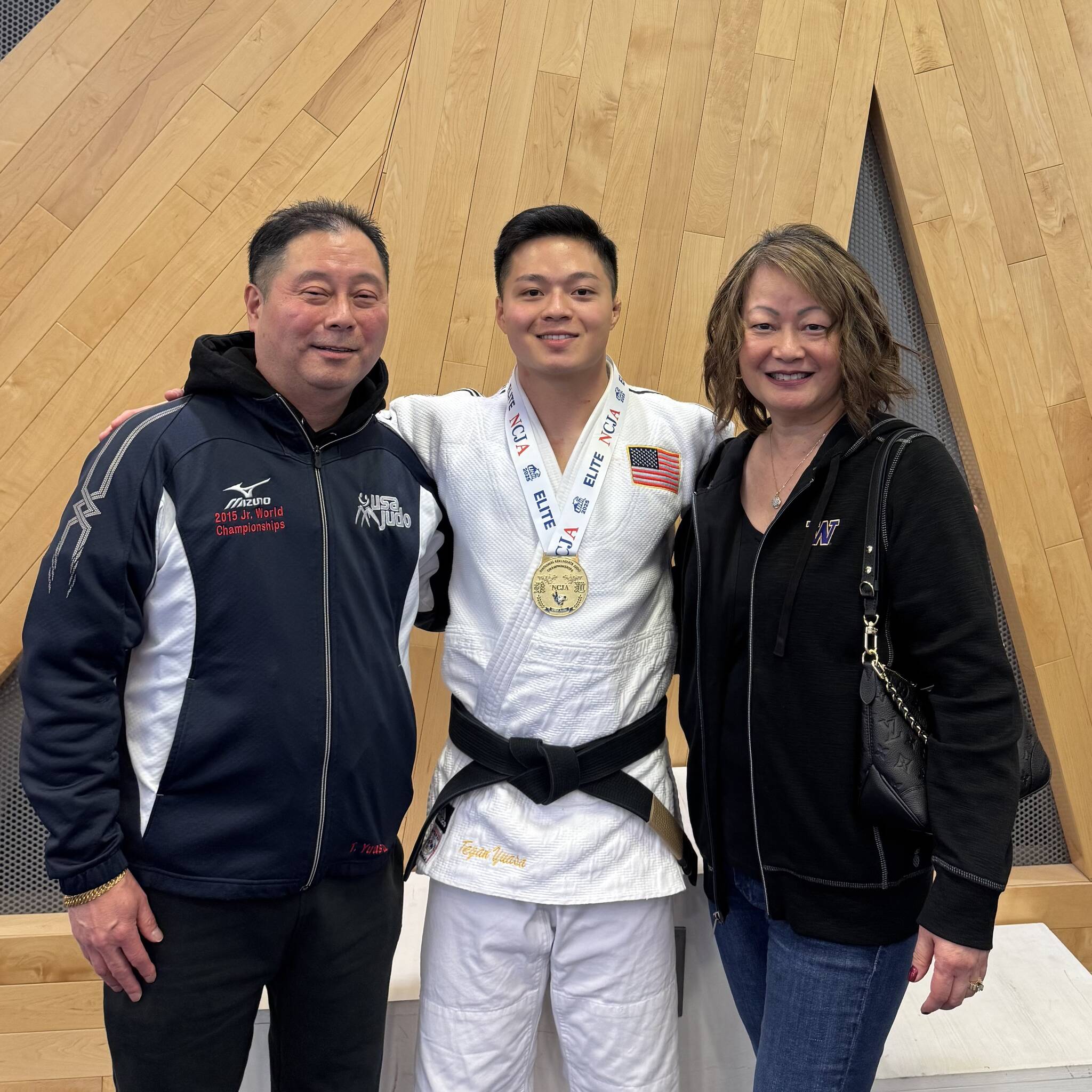 Judo champ Tegan Yuasa poses with his father Mark Yuasa and mother Jeanne Chang at the National Collegiate Judo Association Championships. Courtesy photo