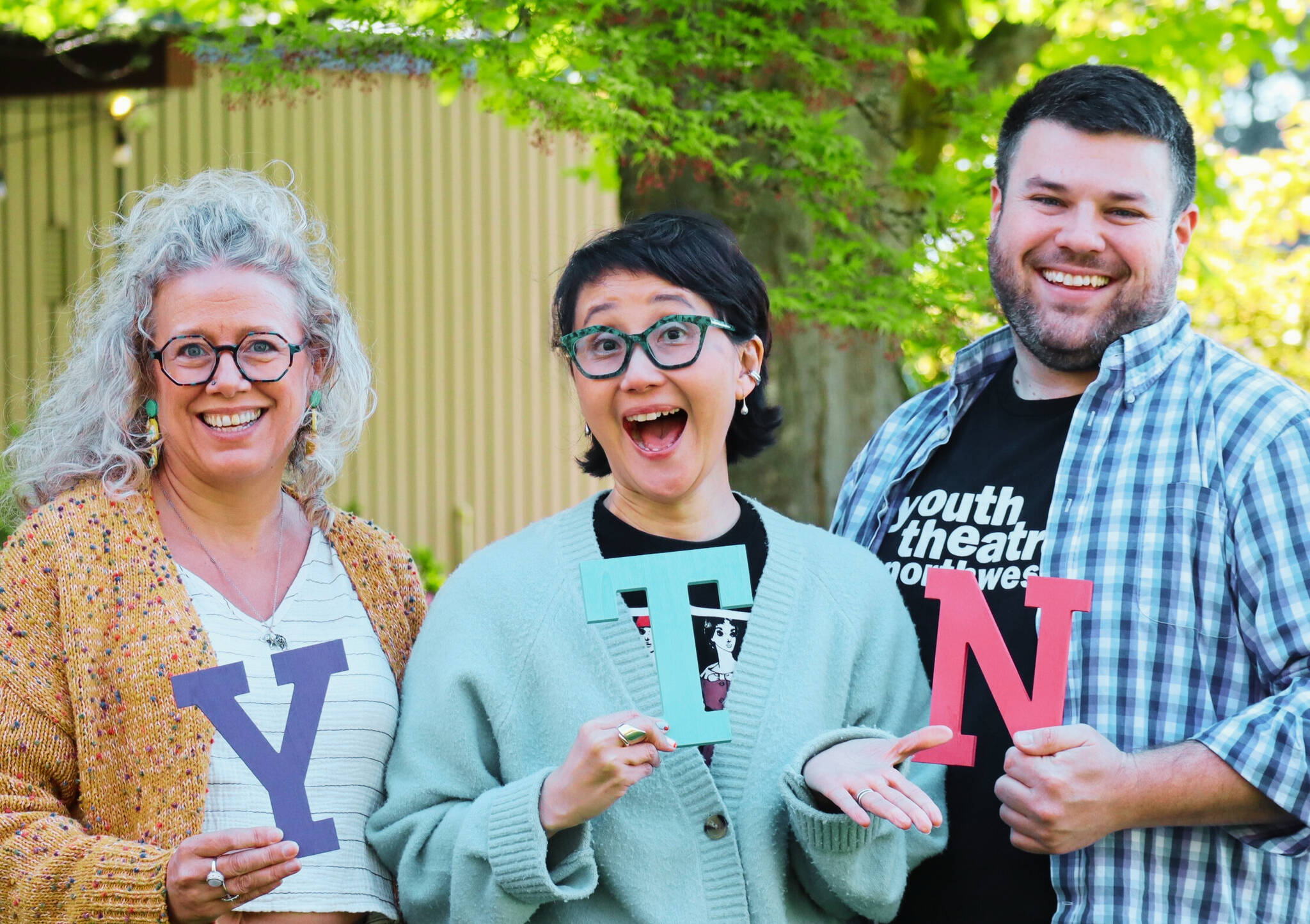 From left to right, Youth Theatre Northwest’s Theresa Heeren, Mimi Katano and Cory Southwell. Courtesy photo