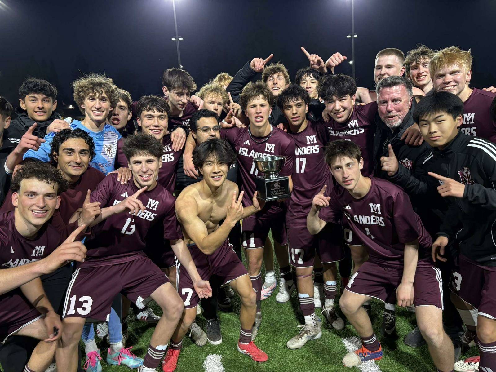 Mercer Island High School’s boys soccer team celebrates its 3A KingCo tournament championship victory on May 13. Courtesy photo