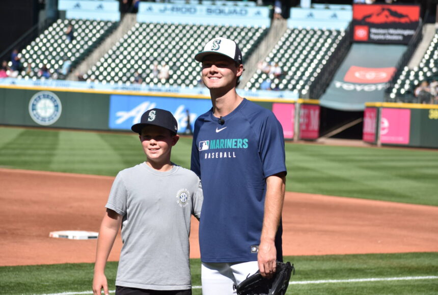 <p>Kade Anderson and his brother Carter during Mariners batting practice. Photo by Ben Ray / Sound Publishing</p>