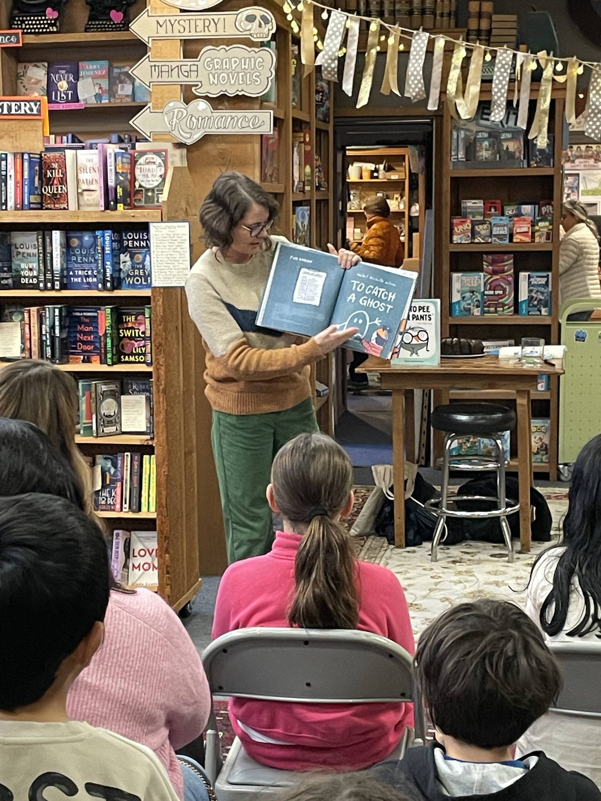 Author-illustrator Rachel Michelle Wilson reads to the crowd at Island Books on Nov. 19. Courtesy photo