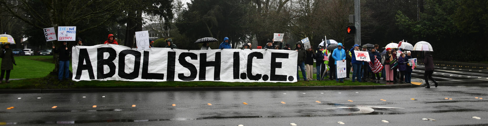 Mercer Islanders led an anti-ICE protest from 3-4 p.m. on Jan. 11 at Island Crest Way and SE 40th Street. Andy Nystrom/ staff photo