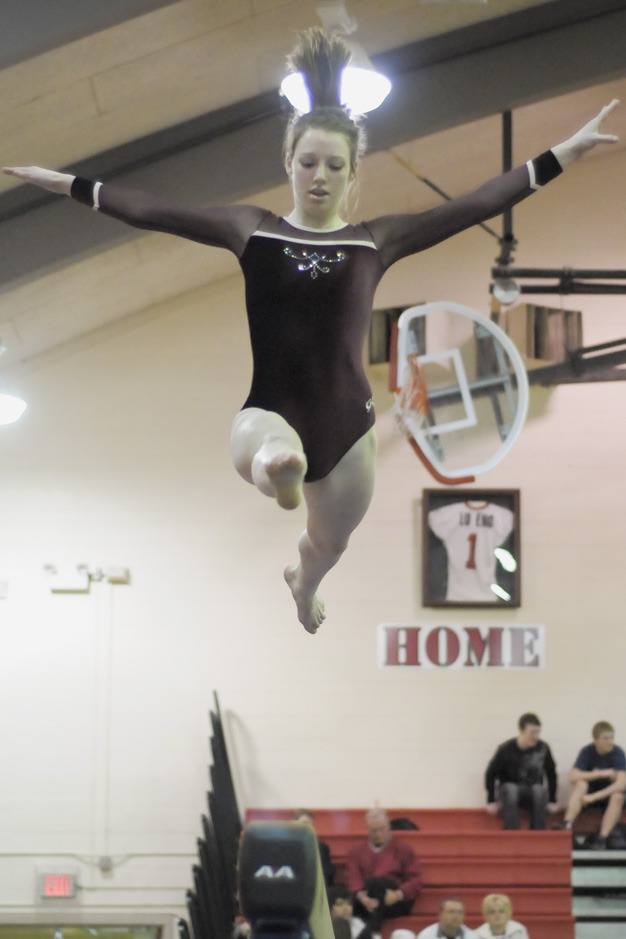 Mercer Island gymnast Emily Lightfoot performs her beam routine during the Islanders’ last meet of the regular season last Tuesday at Sammamish High School. The postseason begins this Saturday.