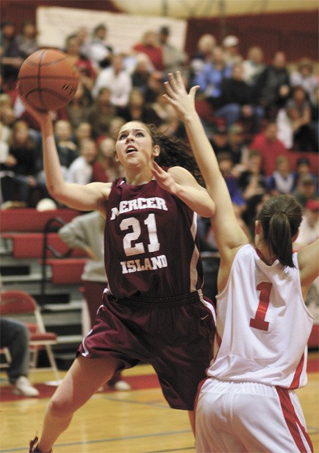 MIHS senior Kate DaPron (21) gets two points for the Islanders on the inside during the Islanders’ conference 51-50 win over Mount Si. DaPron had six points during the game.