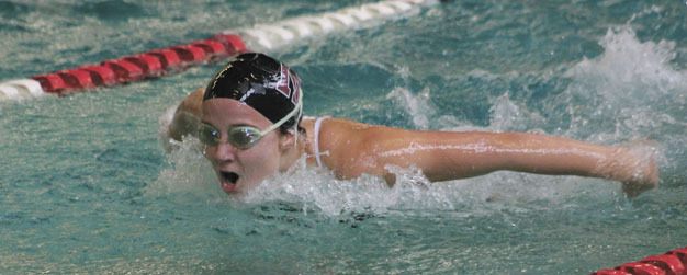 Margaret Seaton propels herself through the water during the 100 yard butterfly race on Thursday afternoon at Mary Wayte Pool against Interlake.