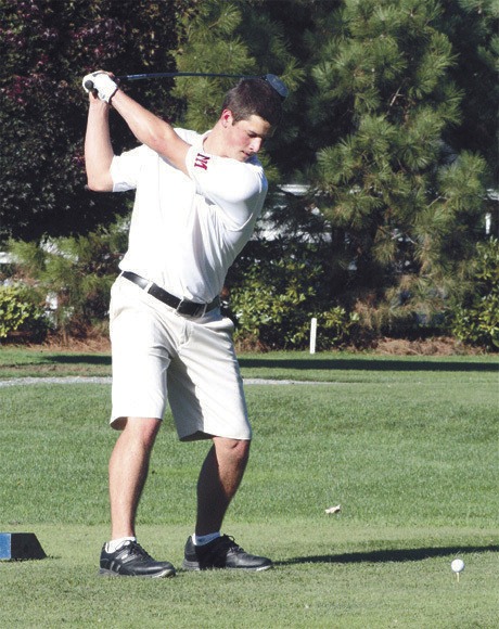 Grant Otter tees off during a boys golf game earlier in the season.