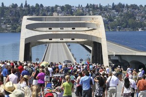 People crowd on the I-90 bridge to watch the U.S. Navy Blue Angels during Seafair.