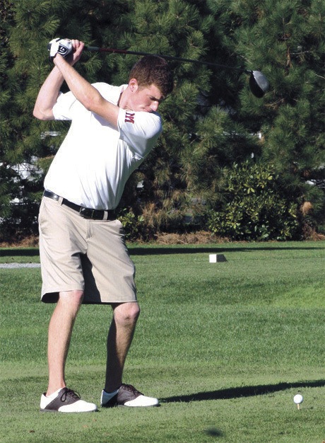 George Jiranek swings on the first hole during the Islanders’ home meet against Lake Washington last week.