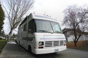 An RV parked on S.E. 34th Street in a March photo has spurred neighbors to petition the city to change its parking ordinance. The vehicle has since been moved into storage.