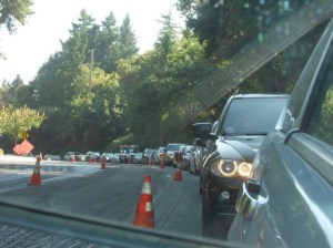Traffic lines up on Island Crest Way as workers are repaving the road Aug. 14-16.