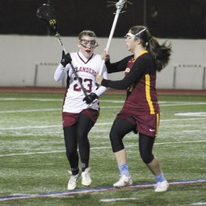 Mercer Island's  Wesley Tomlinson looks for an open teammate during the Islanders home game against Lakeside on Thursday