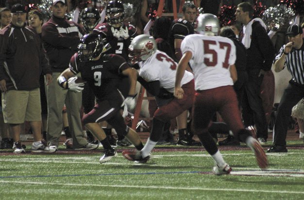 Eric Stefanchik breaks past Mount Si's defenders during the Islanders home win over the Wildcats last week.