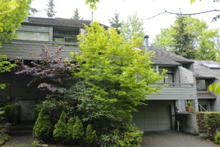 This condo on 93rd Avenue S.E. is one of three Island condos in foreclosure. At least five much larger and more expensive homes here are also being sold by lenders.
