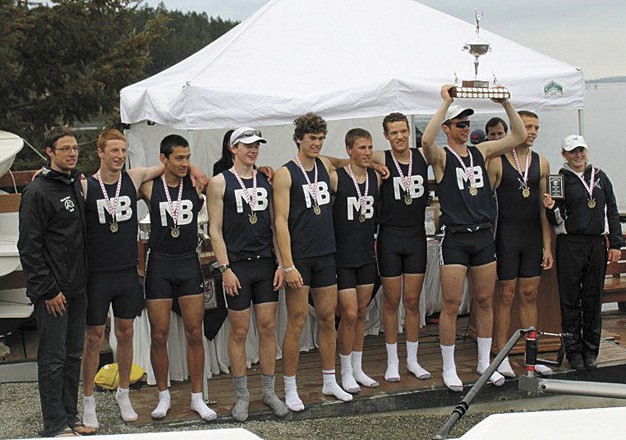 The men's varsity team includes: J.P. Marquart (coach)