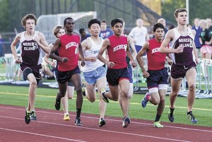 Mercer Island’s Eric Schulz (right) finished the boys 800 meter race in second place