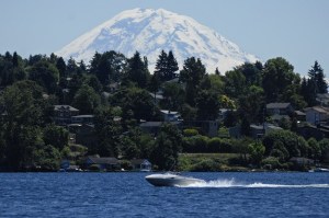 Boaters enjoy temperatures near 80 as Mount Rainier looms over Lake Washington in this view from Clarke Beach Park on Mercer Island on Tuesday