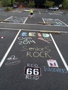 Parents and siblings of Mercer Island High School seniors filled the parking lot with chalk drawings to be an early morning surprise on the first day of school.