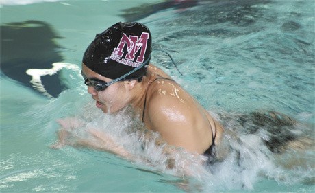 Alyssa Hatsukami heads down the pool during the breaststroke portion of the 200-meter individual medley race. She won the first heat with a time of 2:34.27.