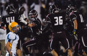 Islander DB Parker Scott (24) celebrates an interception during a playoff game against Ferndale at Mercer Island on Friday. Mercer Island won 21-14.
