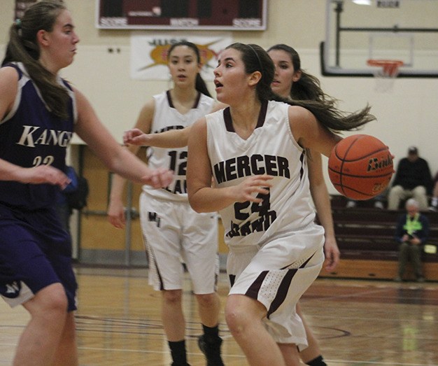 Mercer Island’s Julia Blumenstein looks to drive against  Lake Washington Friday