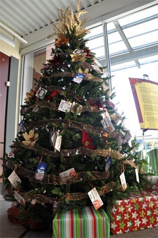 The Youth and Family Services Giving Tree is located in the Mercer Island Community and Event Center lobby. Tags on the tree are for items that will help families in need.